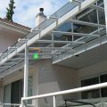 kanopi stainless minimalis modern dengan atap solarflat dan alderon