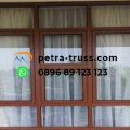 Pintu sliding aluminium rumah di Cimanggis Depok oleh Petra Truss